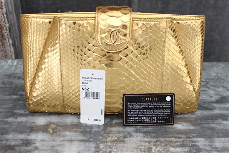 chanel gold clutch bag price|chanel denim clutch.